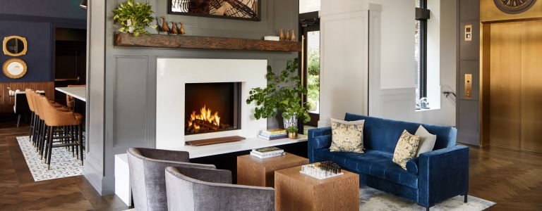 A Living Room With A Fireplace