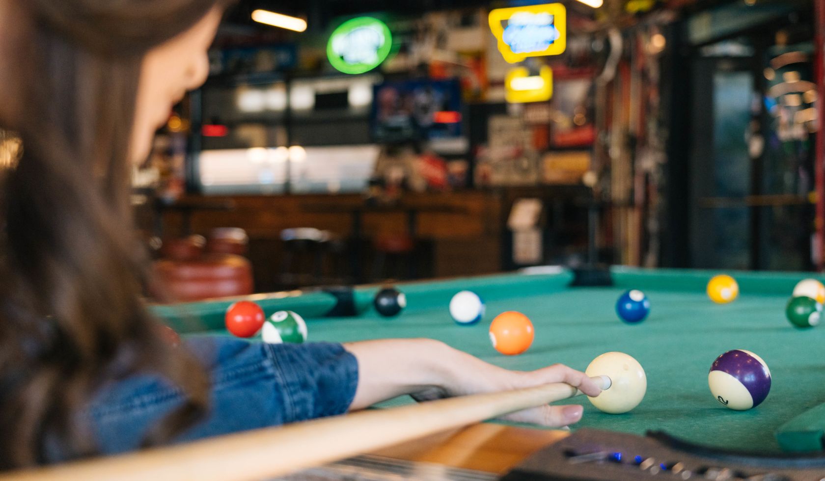 A Person Playing Pool